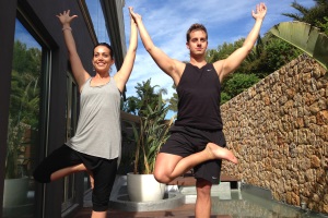 Paul practising yoga with teacher Ayda Ellis at Aguas de Ibiza