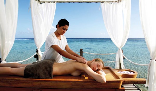 Experience a massage on the beach at Shanti Maurice Resort and Spa in Mauritian Paradise