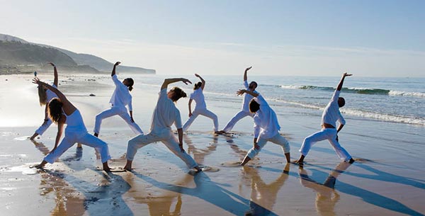 A yoga class on the beach at Paradis Plage